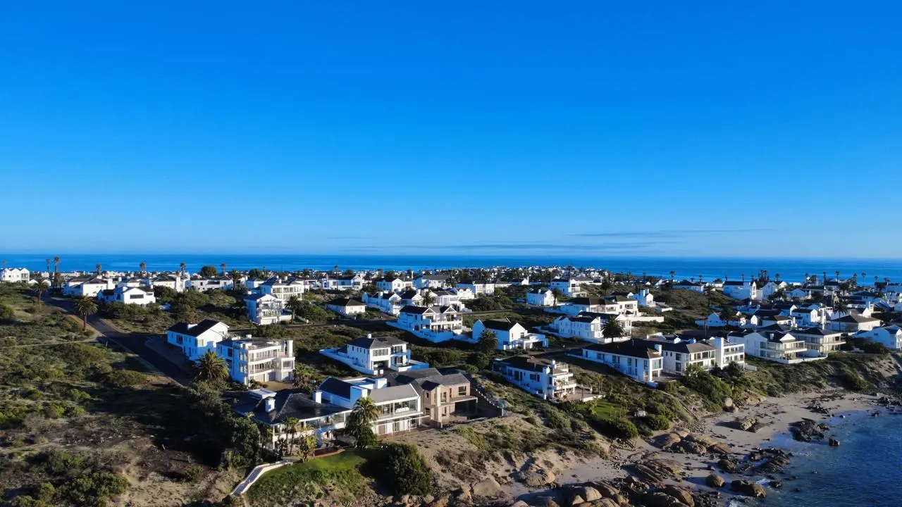Shelley Point estate from above: white houses on the peninsula between the dunes and the sea